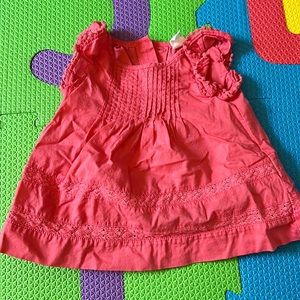 Dress with eyelet stitching